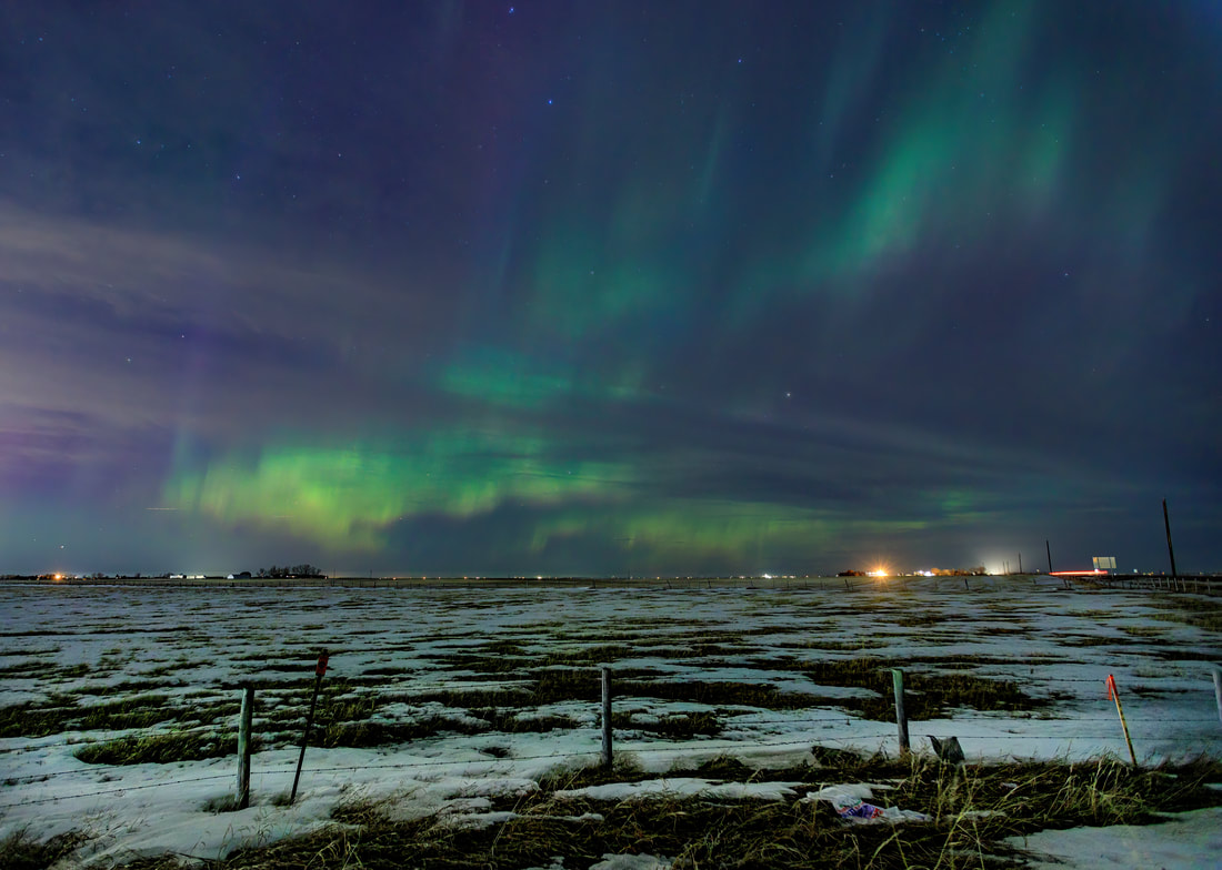 Northern Lights over a farmers field