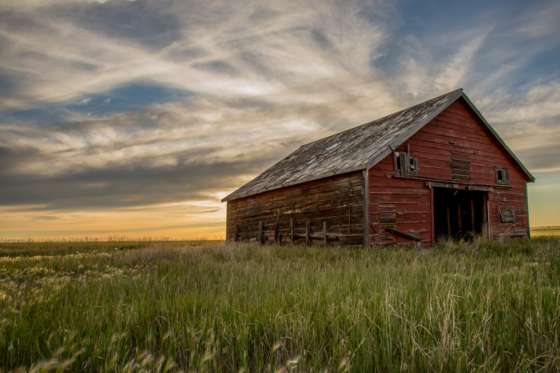 <img src="barn.jpg" alt="a red barn stands in a field during sunset">  height="300" width="300"