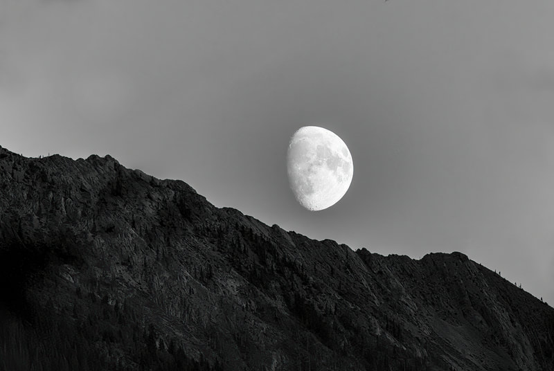 <img src="moon.jpg" alt="a partial moon rises over a mountain ridge"> height="300" width="300"