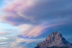 <img src="clouds.jpg" alt="soft, wispy clouds swirl above Crowsnest mountain during sunset">  height="300" width="300"