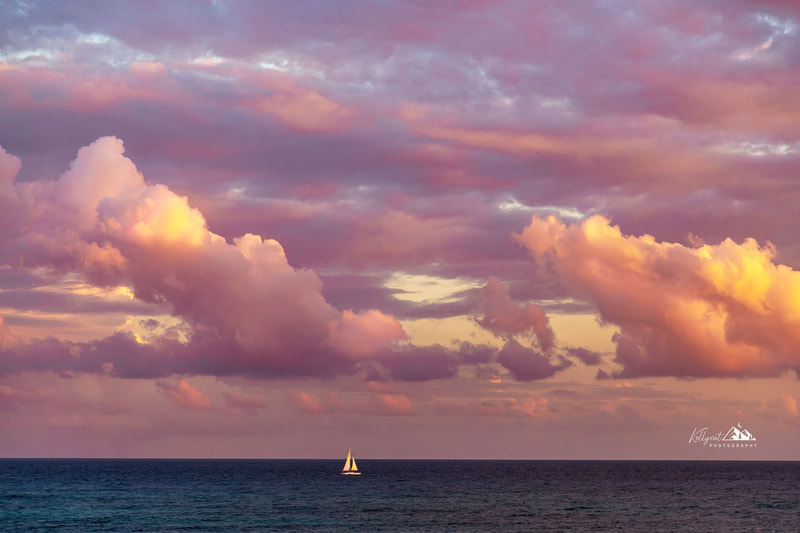 <img src="sail.jpg" alt="a sailboat floats through a gorgeous blue sea while cotton candy clouds billow above during sunset">  height="300" width="300"