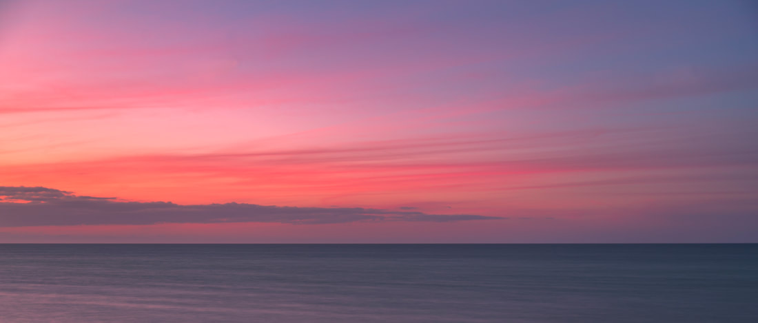 A pastel sunset over the sea
