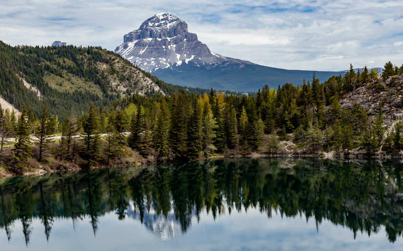 <img src="mountain.jpg" alt="Crowsnest mountain as seen from Emerald Lake">  height="300" width="300"